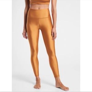 Athleta Elation Shine Tights in Metallic Gold NWOT